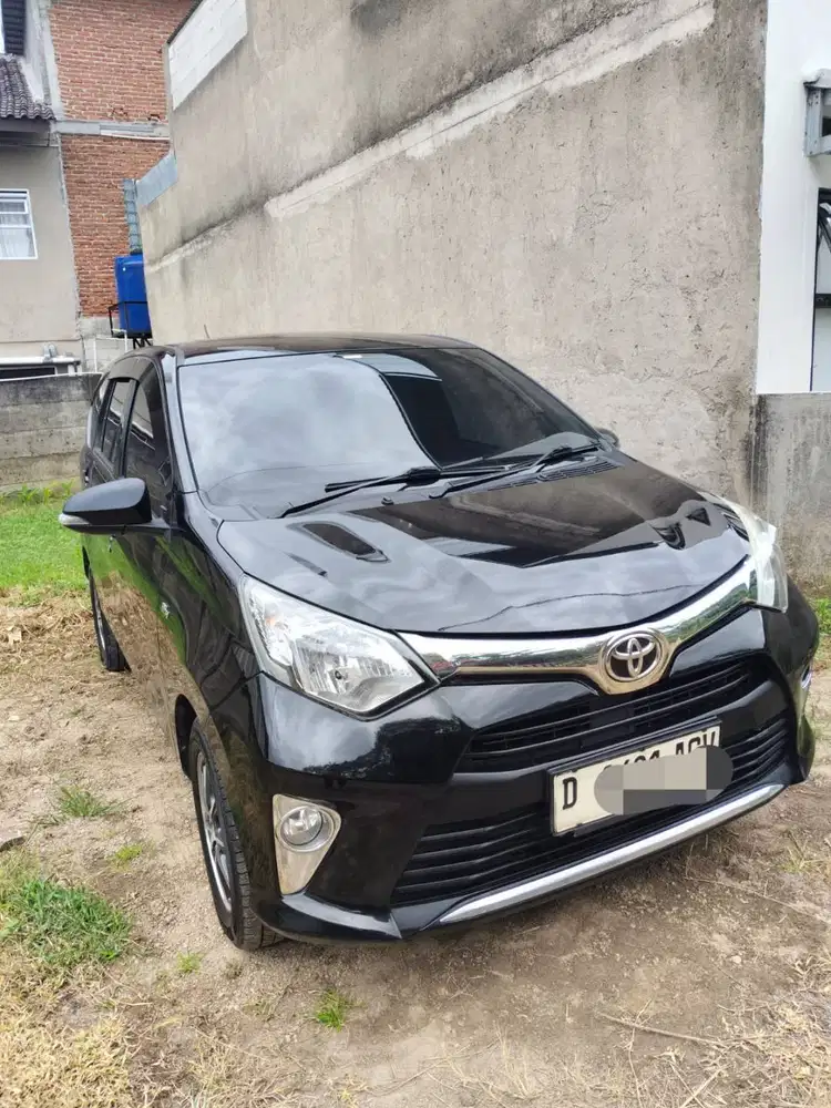 Calya 1.2 G AT Km. 90.000 Hitam Metalik