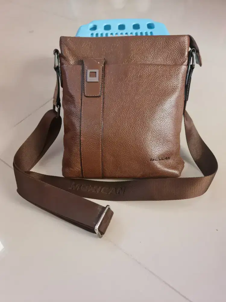 75. Tas Pria Leather Sling Bag Mexican Brown

ASLI KULIT