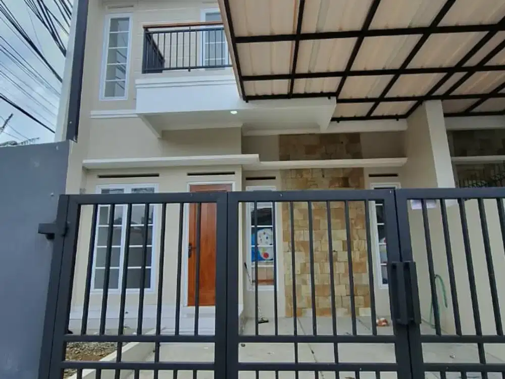 Rumah baru deplu bintaro dekat halteu adam malik Jakarta