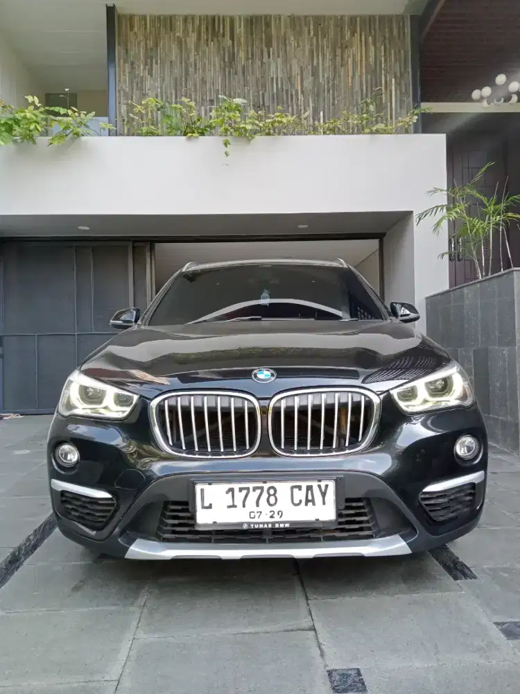 BMW X1 th 2018 type 1.5 sdrive Xline bensin matic hitam