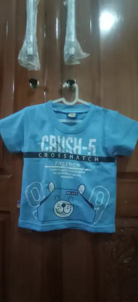 Baju main anak di rumah