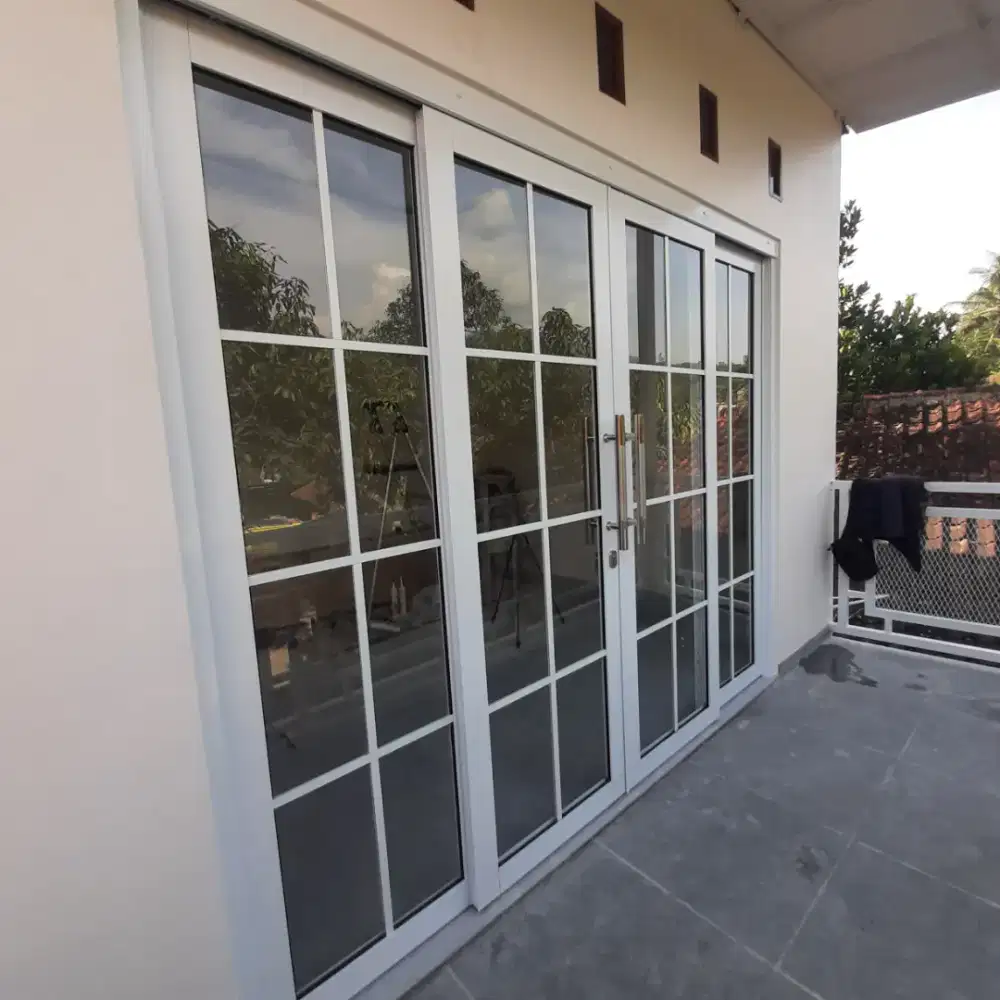 Pintu Sliding Swing Aluminium Minimalis