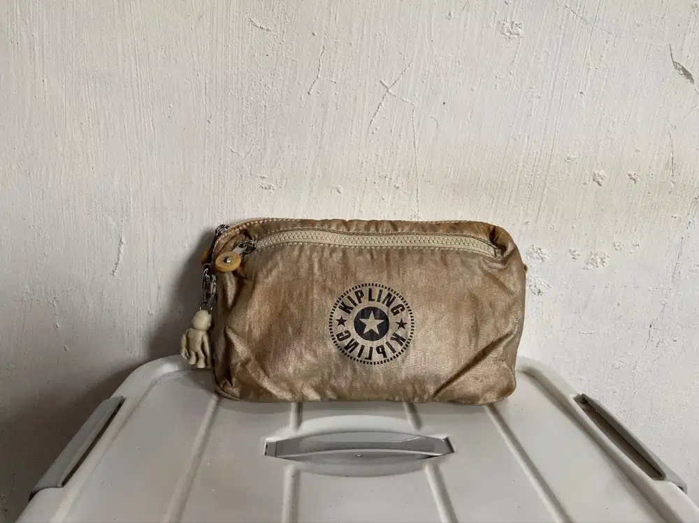 tas sling bag brand Kipling original - cream - LIKE NEW preloved