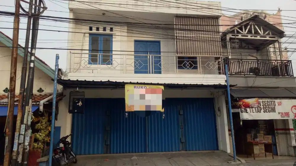 Ruko 2 lantai, dua pintu jadi satu. Pinggir jalan ramai, strategis
