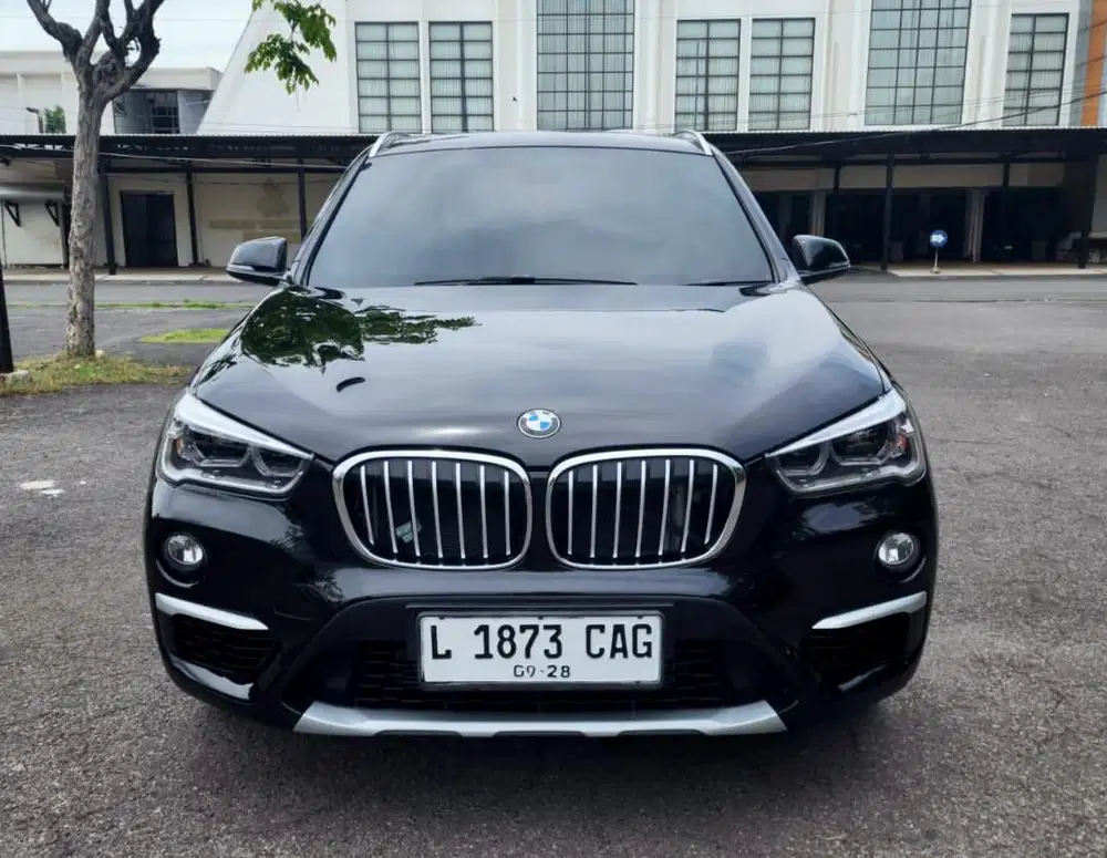 BMW X1 18i XLINE AT 2018 .LOW KM 25RB SPRTI BARU