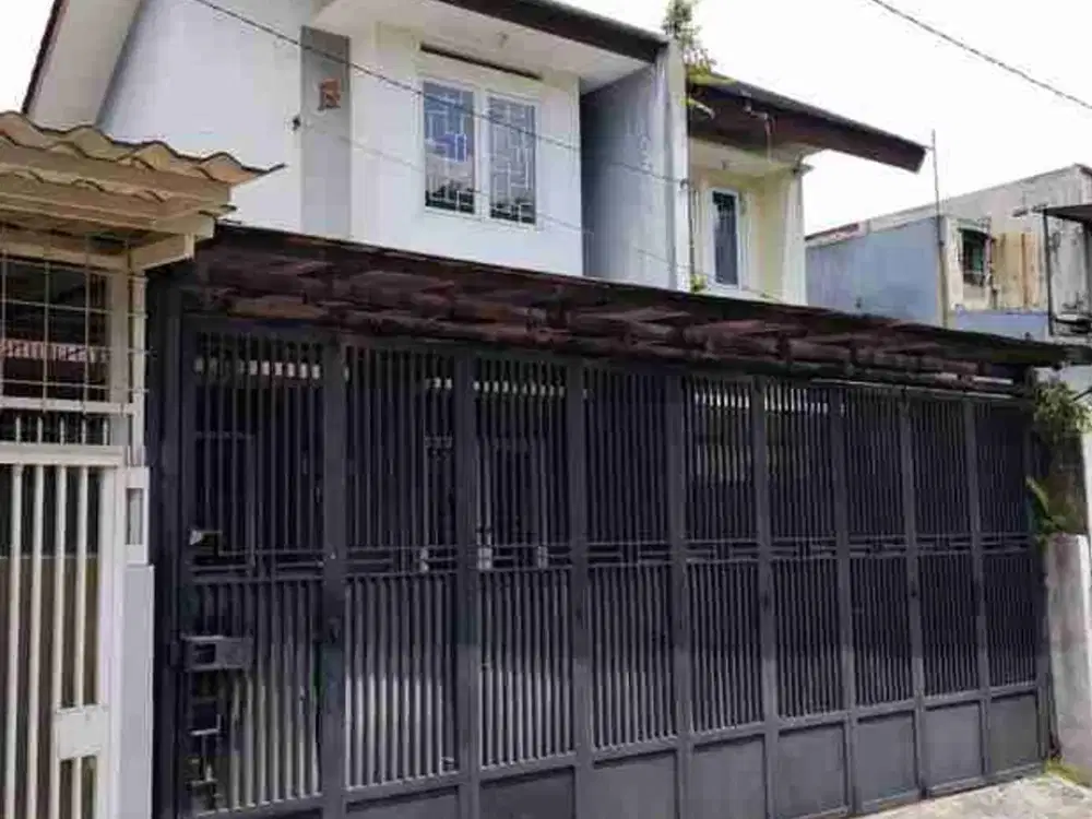 Rumah di Jln sudirman belakang BPK Penabur