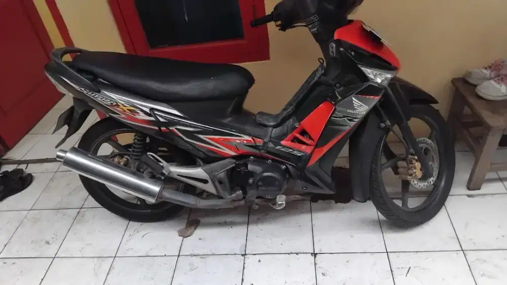 Supra 125 2013 merah