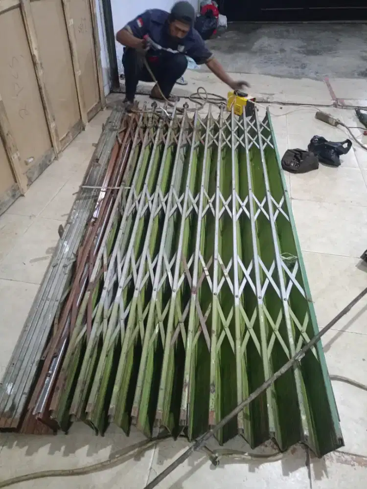 Tukang reparasi service folding gate rolling door murah