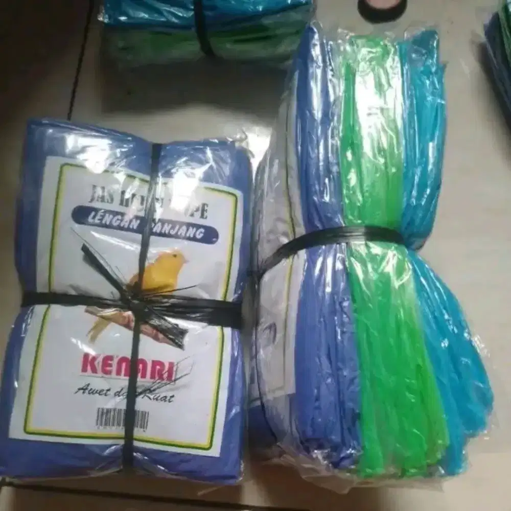 Jas hujan plastik Setelan