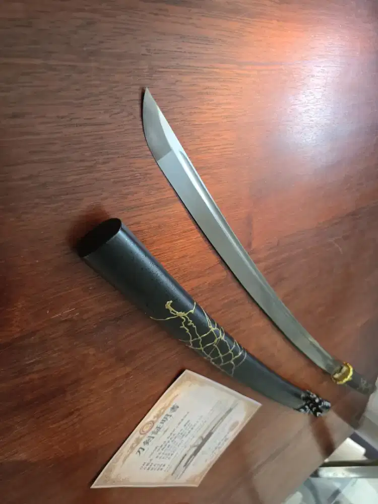 pedang dari serial gaming Ghost of Yotei Gilden Dawn katama sword