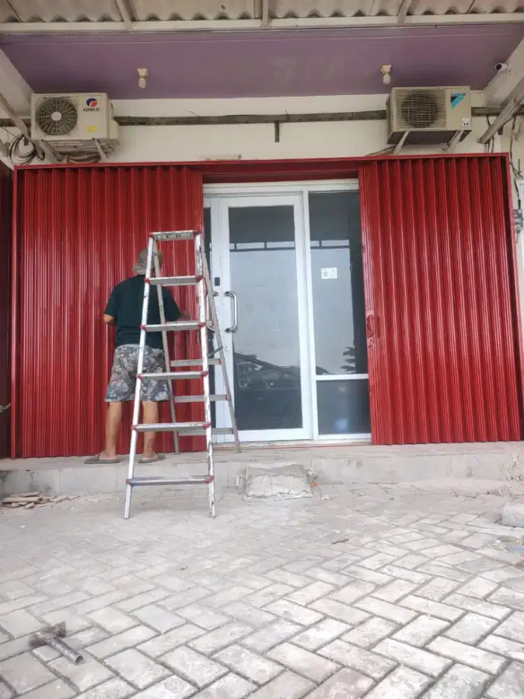 Folding gate harmonika dan rolling door aneka reka