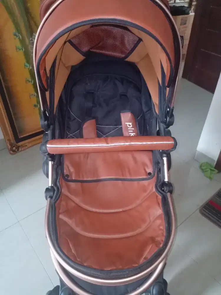 Stroller pliko elegante.