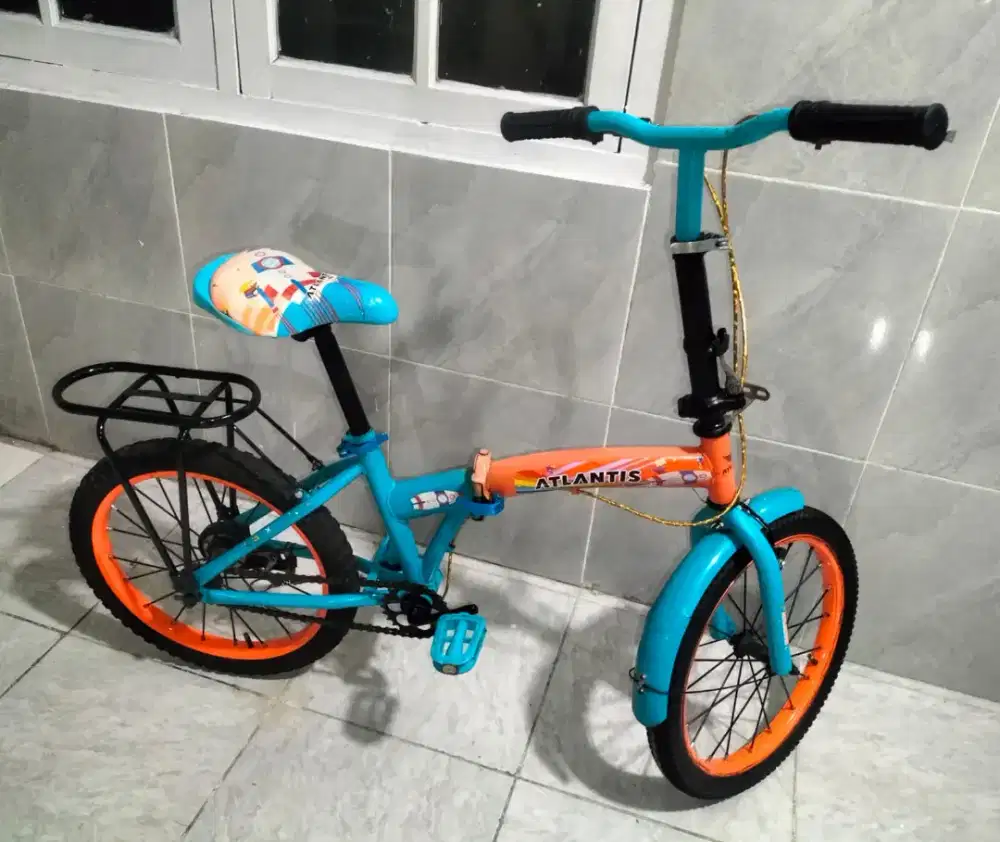 Sepeda lipat ukuran 18 kondisi normal untuk usia 6 7 8 9 tahun