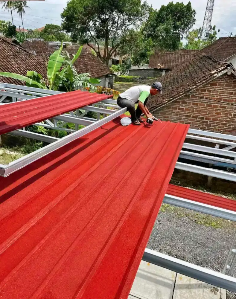 Pasang baja ringan atap spandek pasir