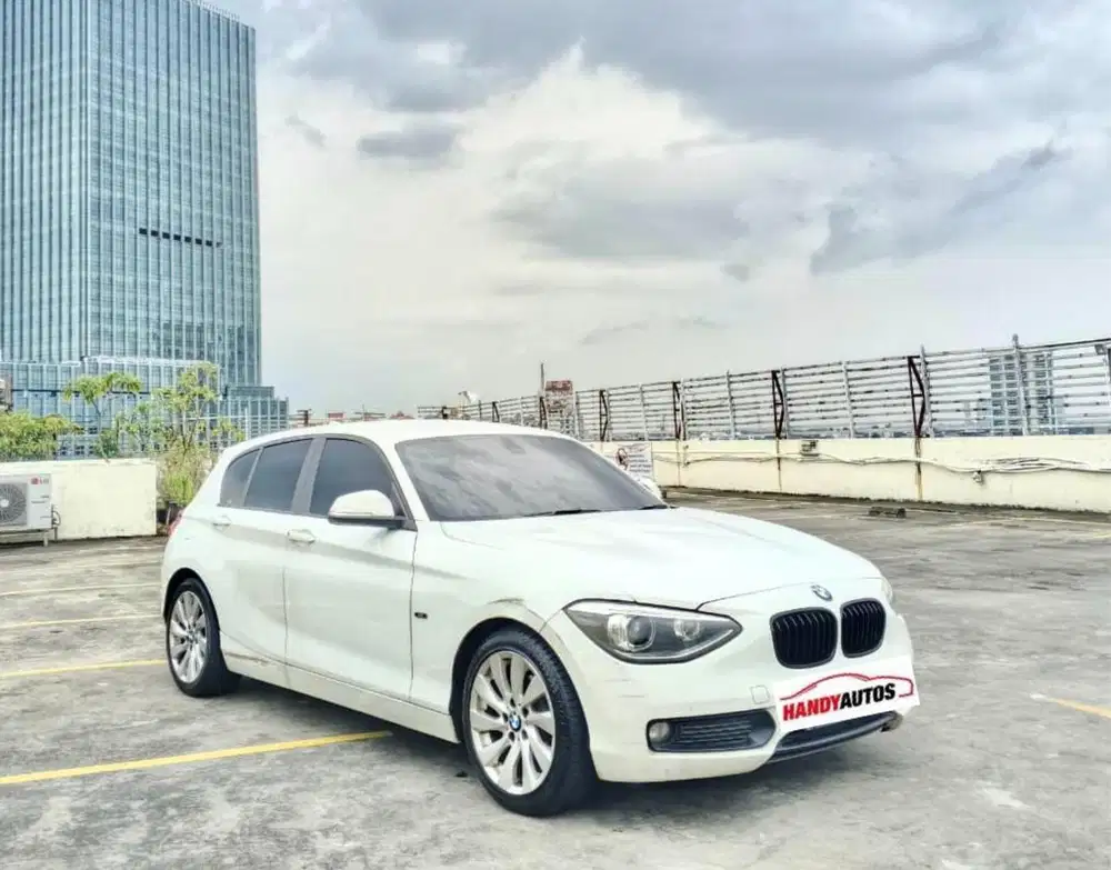 BMW 116i Tahun 2012 Automatic Putih Metalik yang sangat terawat
