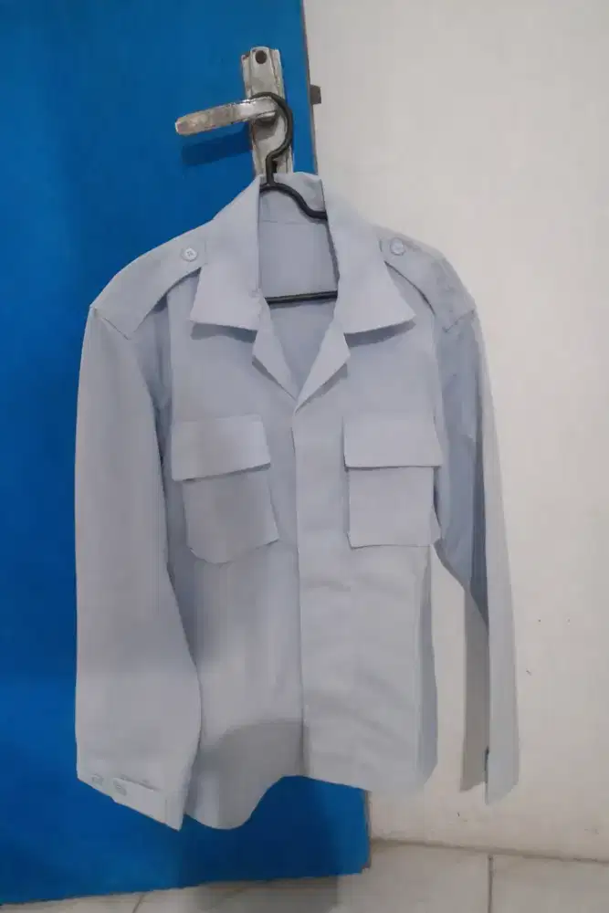 Seragam biru muda PDL