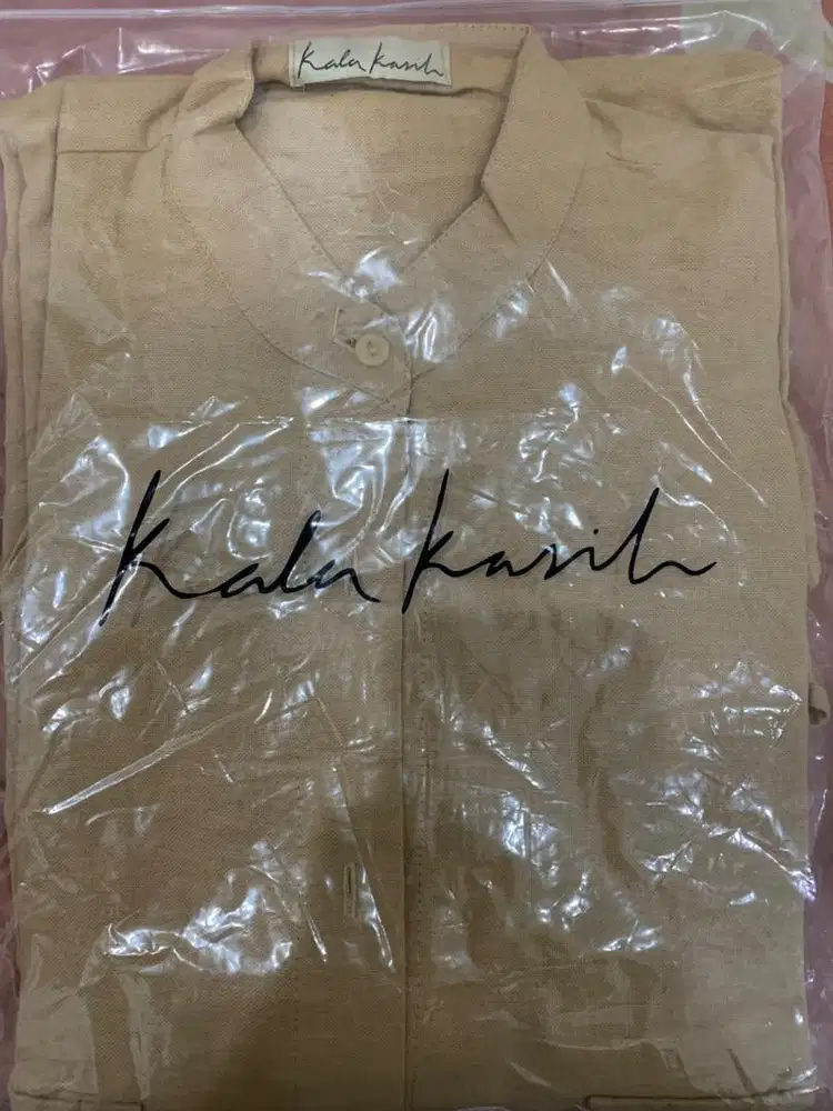 Baju koko kala kasih