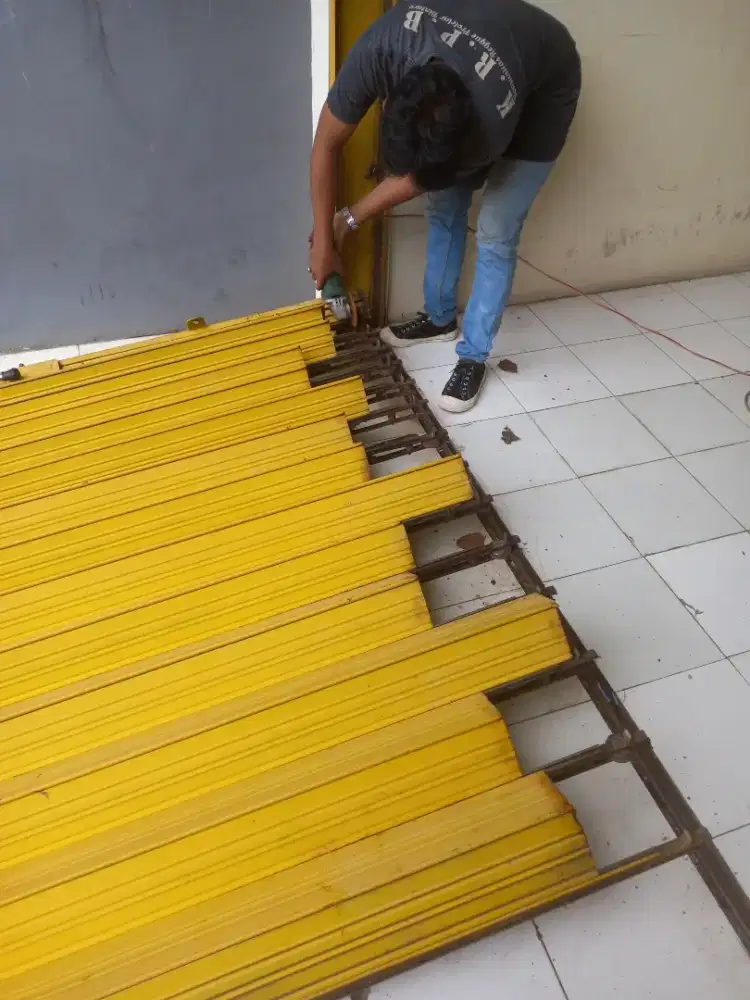 Tukang service rolling door folding gate murah