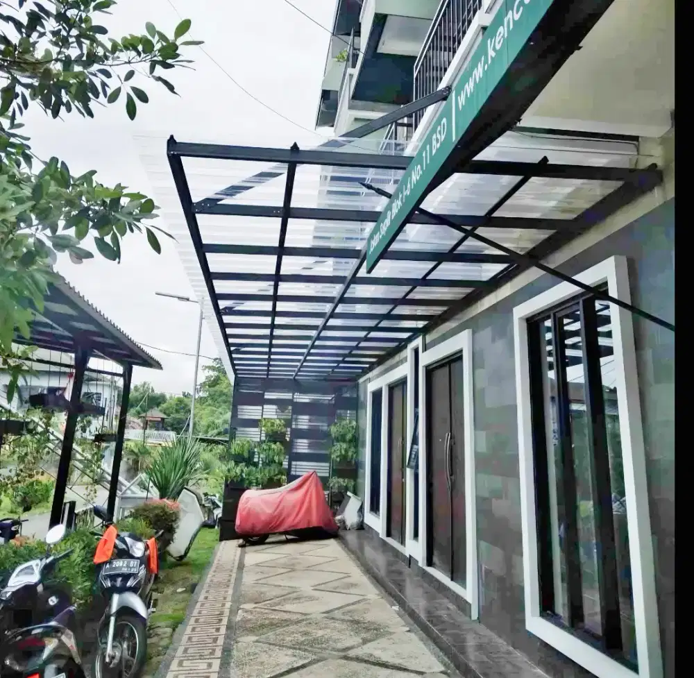 Pasang kanopi baja ringan atap transparan