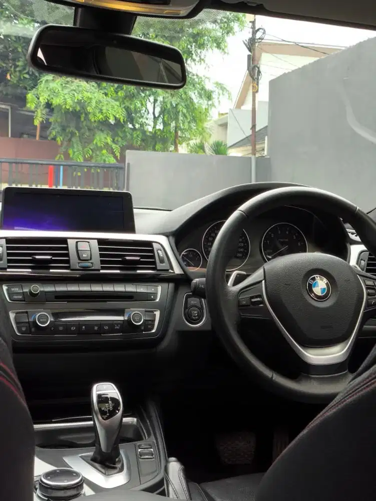 BMW 320i 2014 Bensin