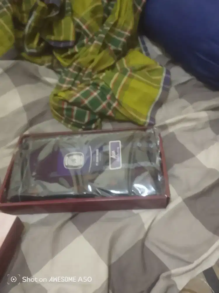 sarung solat merk gajah duduk