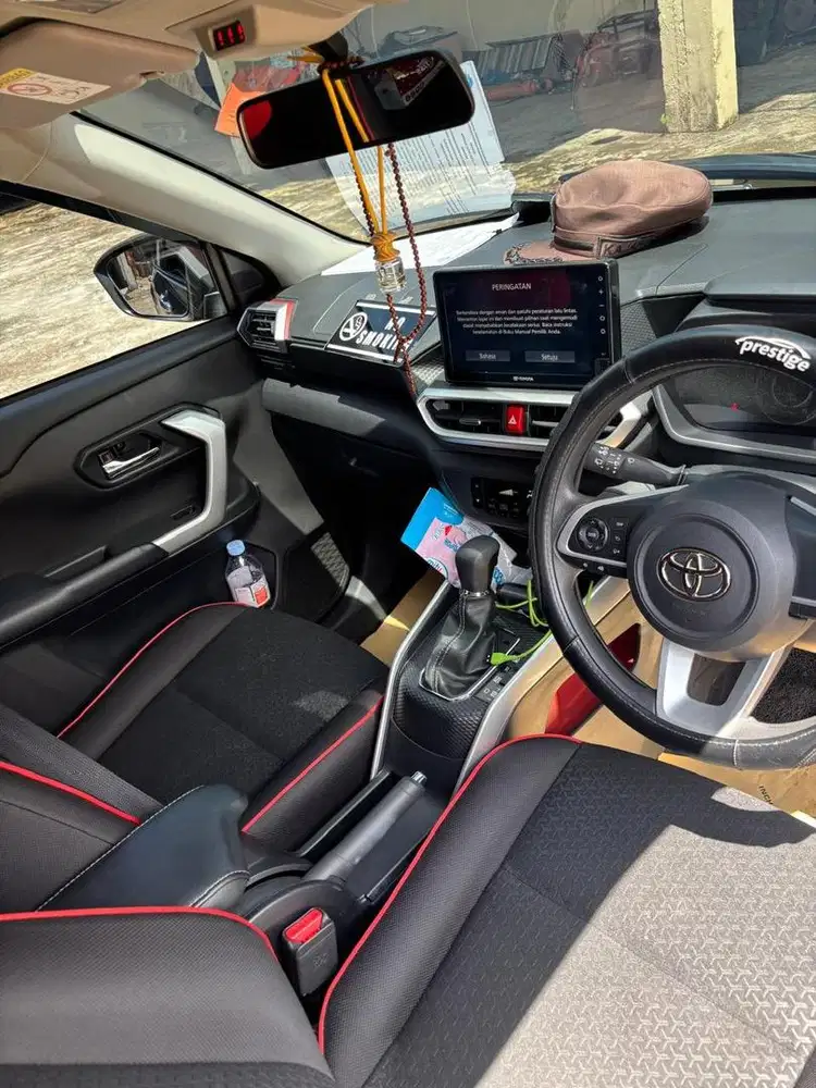 mobil raize kepemilikan pertama