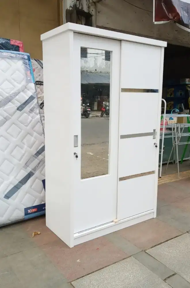 LEMARI PINTU GESER 2 PINTU BAHAN TRIBLOK