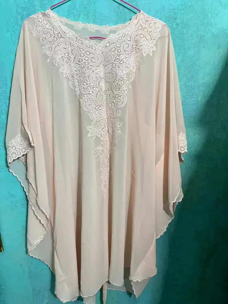 Kaftan seperti baru jarang dipakai