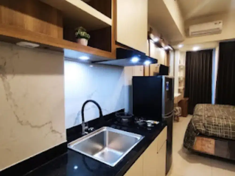 DIJUAL SEGERA Apartemen Amor Connecting Pakuwon City Mall Studio Full furnished Mewah