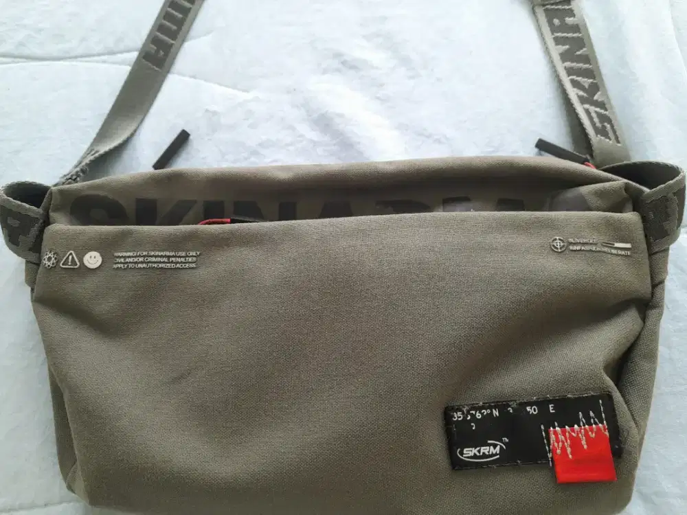 Tas lengan SKINARMA SKRM Original Japan kondisi 75%