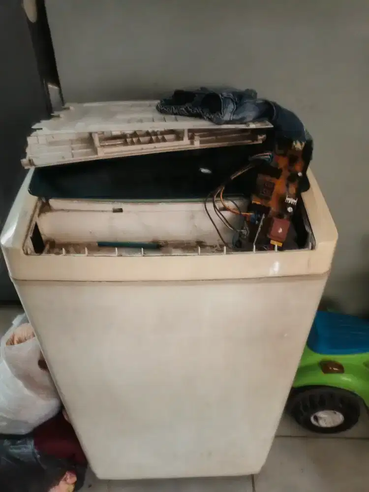 Mesin cuci Sharp minus tidak mau hidup