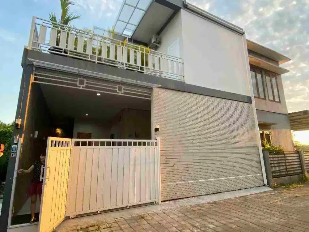 RUMAH MODERN MINIMALIS DEKAT SIDEWALK DI BUKIT LESTARI JIMBARAN