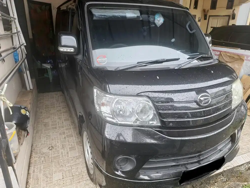 Luxio 1.5 D M/T hitam