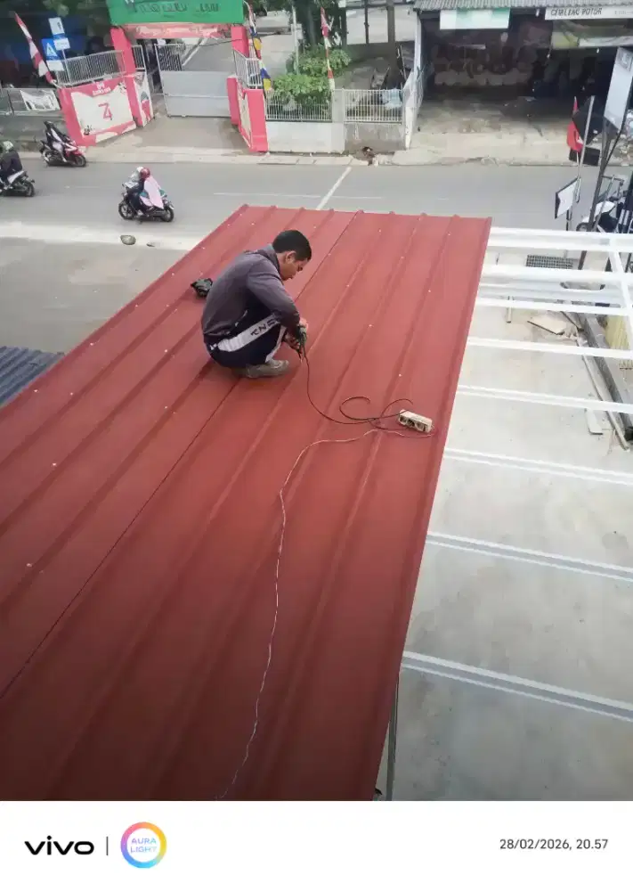 Pasang  baja ringan atap spandek