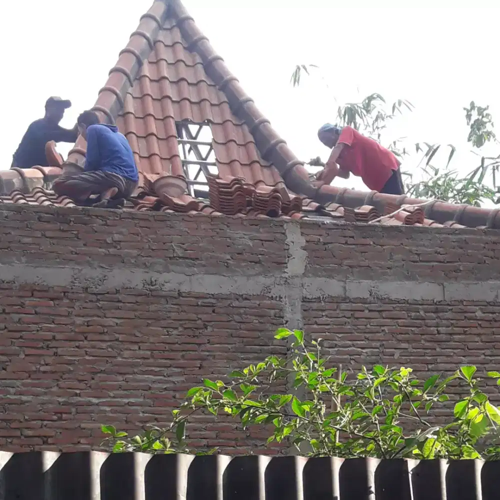 Tukang dan kenek bangunan