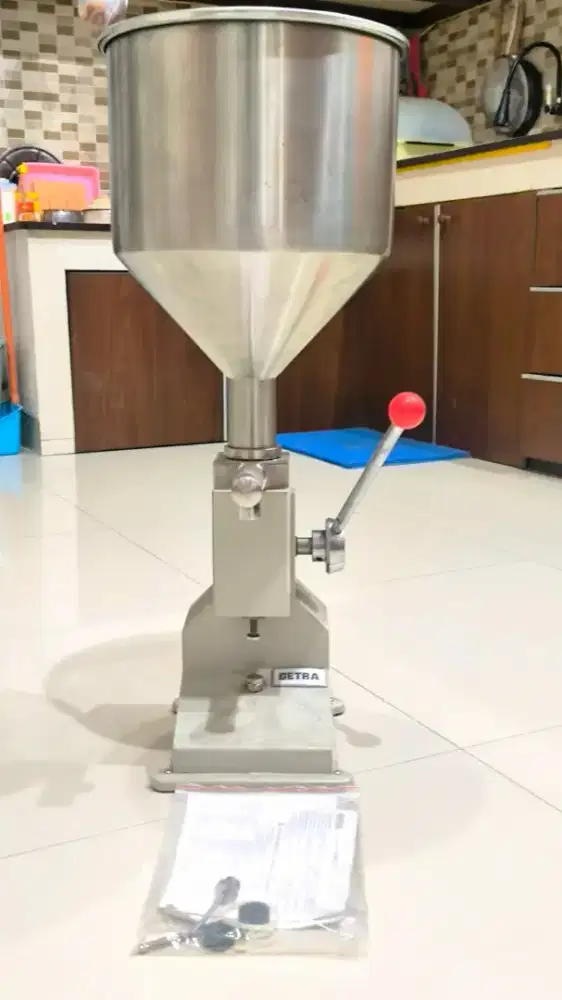 Mesin Filling Cairan/Pasta Manual GETRA Stainless Kondisi Jrg Dipakai