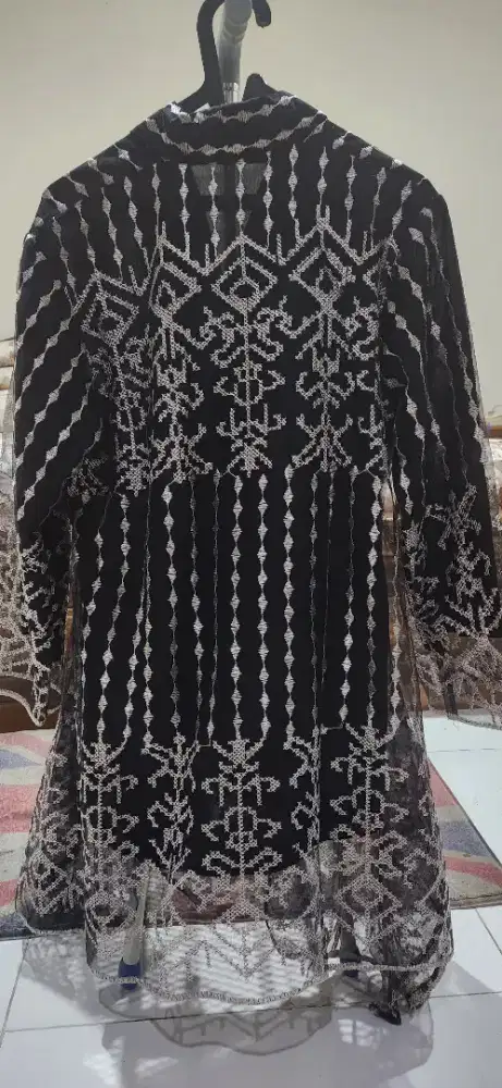 Baju kurung mewah
