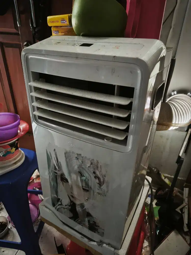 AC Portable Midea 1/2 PK