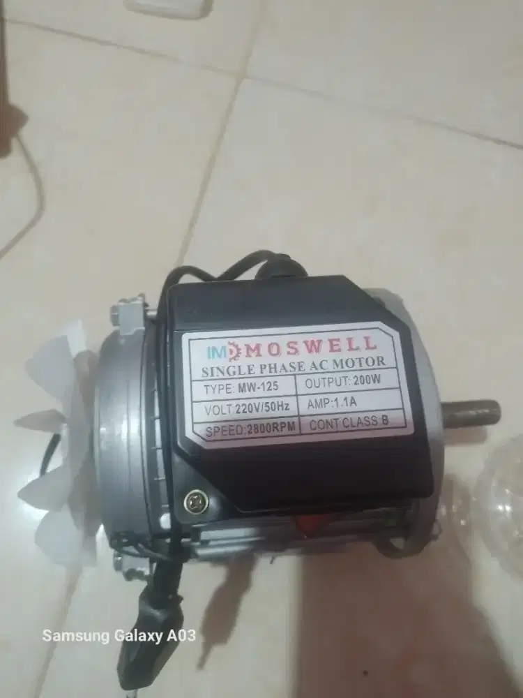 Dinamo mesin parut kelapa masih baru + kardus nya .