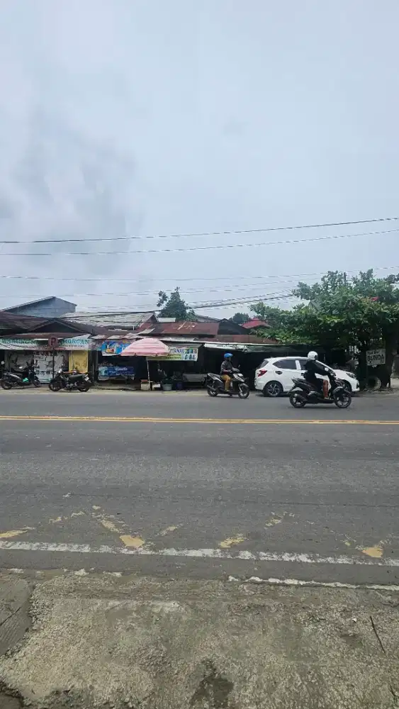 TANAH DI JUAL LOKASI PINGGIR JALAN JL AWS AIR PUTIH SAMARINDA KALTIM