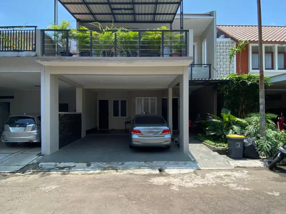 RUMAH MODERN TROPIS TANAH LUAS DALAM CLUSTER di PERUMAHAN THE ADDRESS CIBUBUR