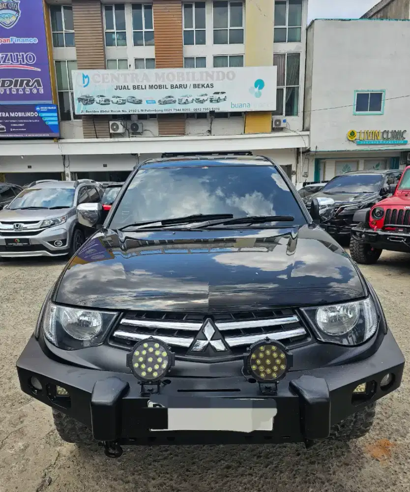 Triton Exceed 4x4 MT 2014 istimewa dp 55 jt