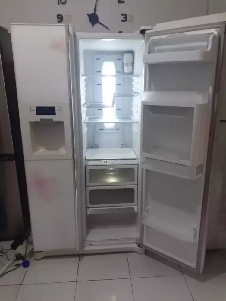 Service mesin cuci dispenser freezer showcase kompor gas chiler kulkas