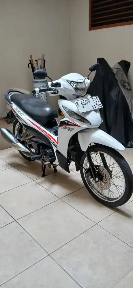 Honda Revo 110 PGMFI 2015 Kondisi Terawat dan Siap Pakai