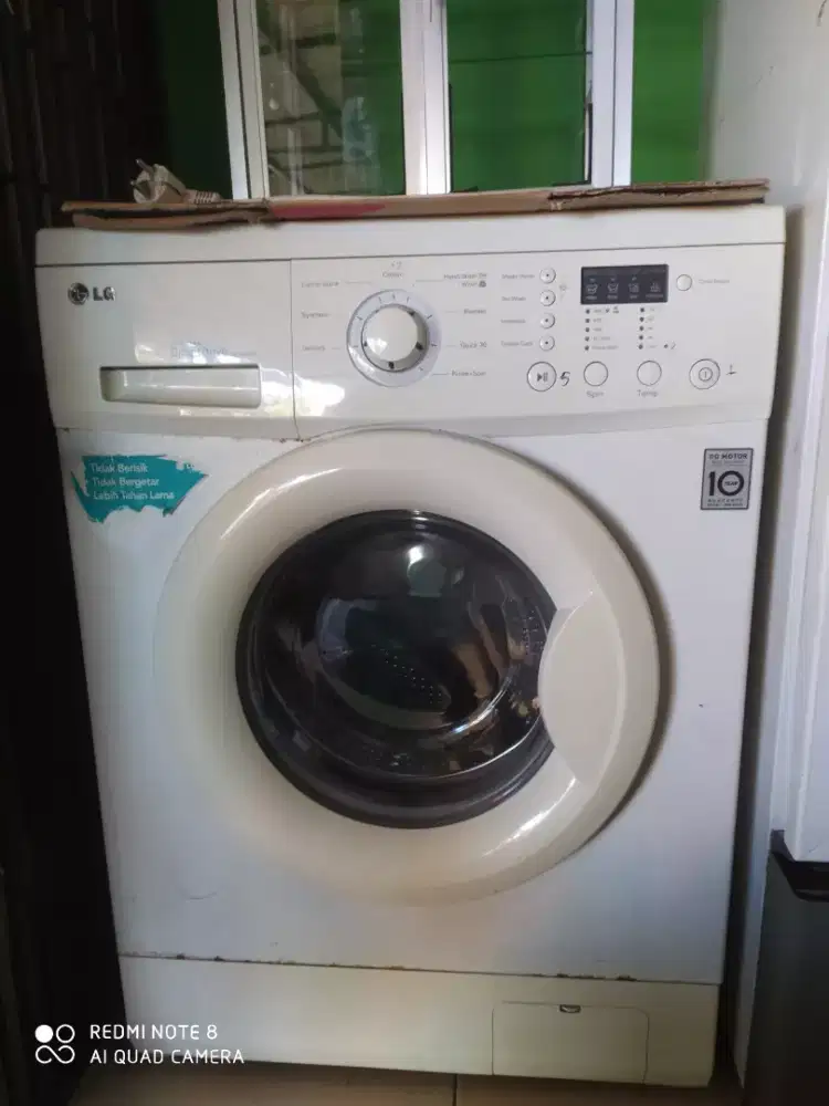 Mesin cuci pintu samping