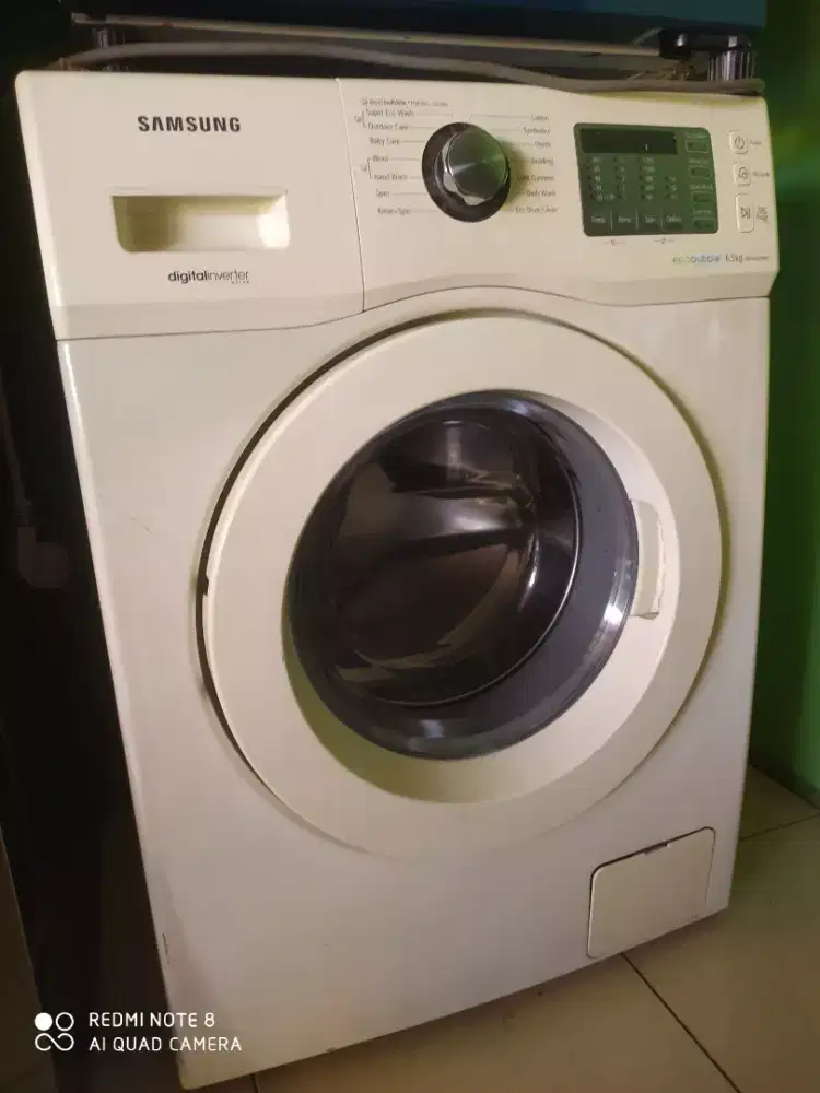 Mesin cuci pintu samping