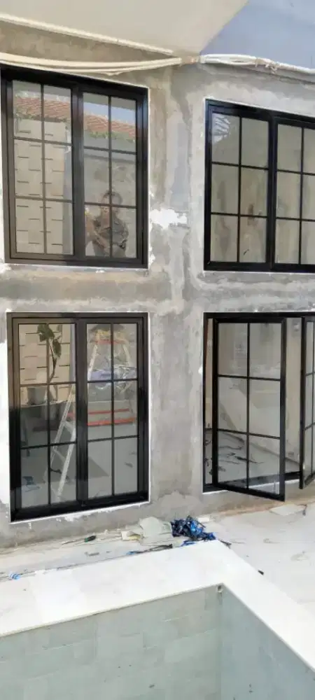 Jasa pembuatan dan pemasangan pintu dan jendela almunium