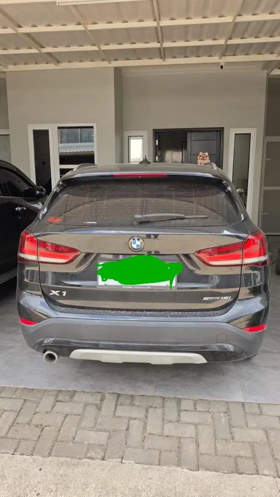 BMW X1 HITAM PANORAMIC SUNROOF
