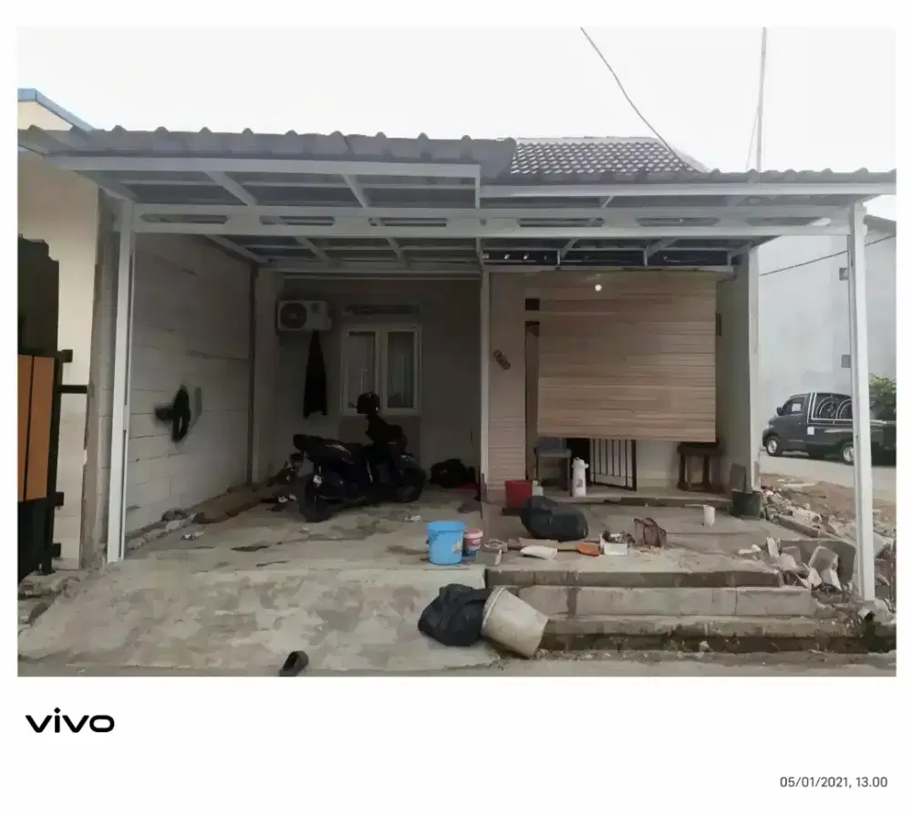 Kanopi baja ringan dan garasi