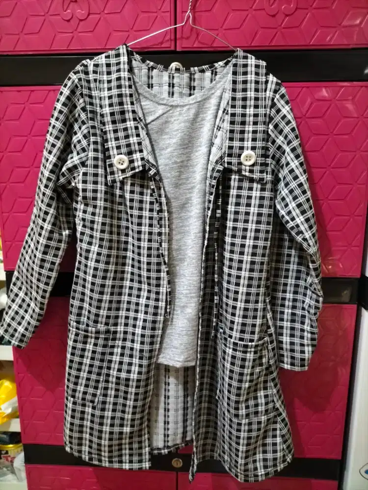 Baju atasan rompi